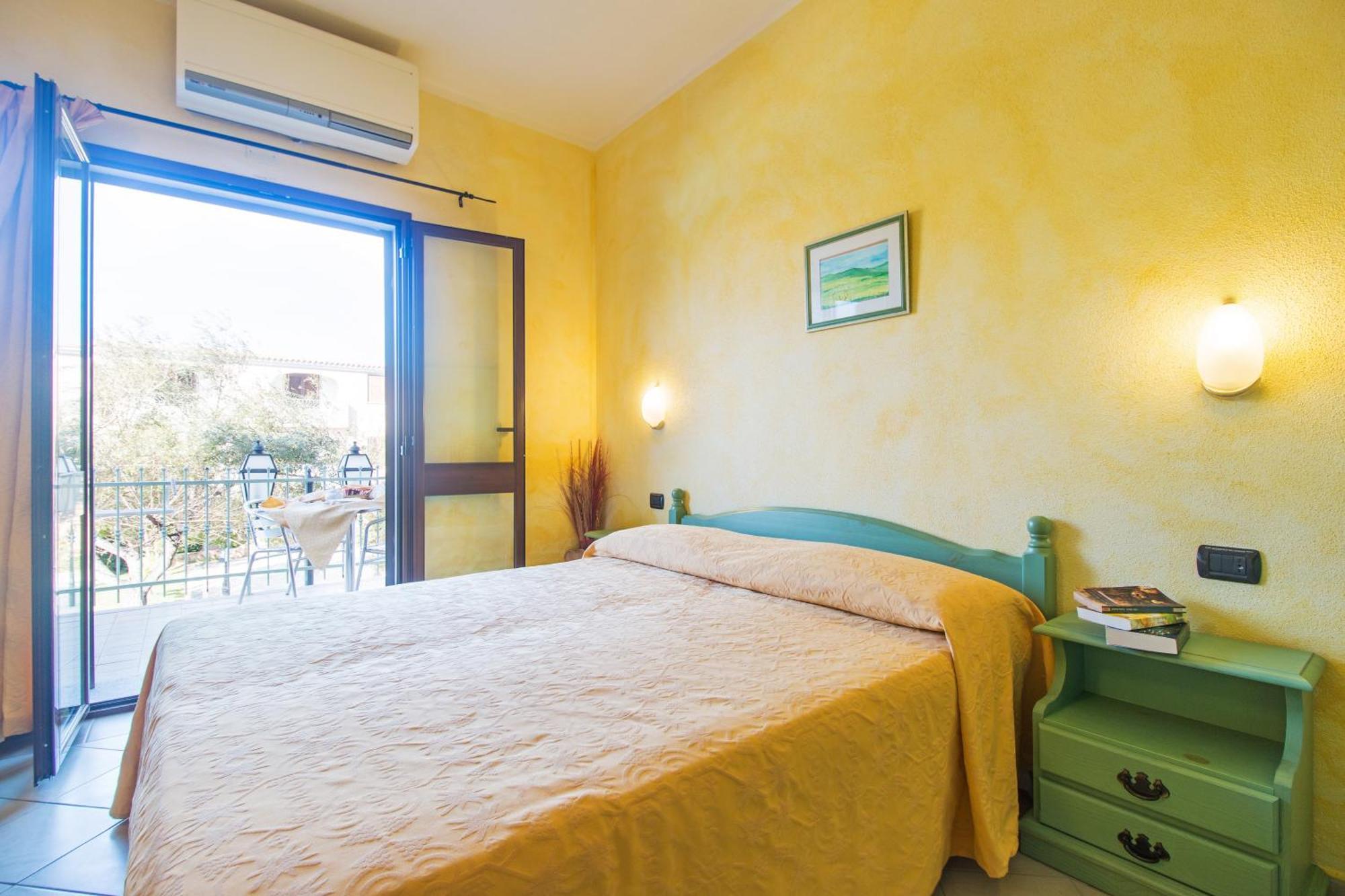 Appartamenti Cala Liberotto Esterno foto